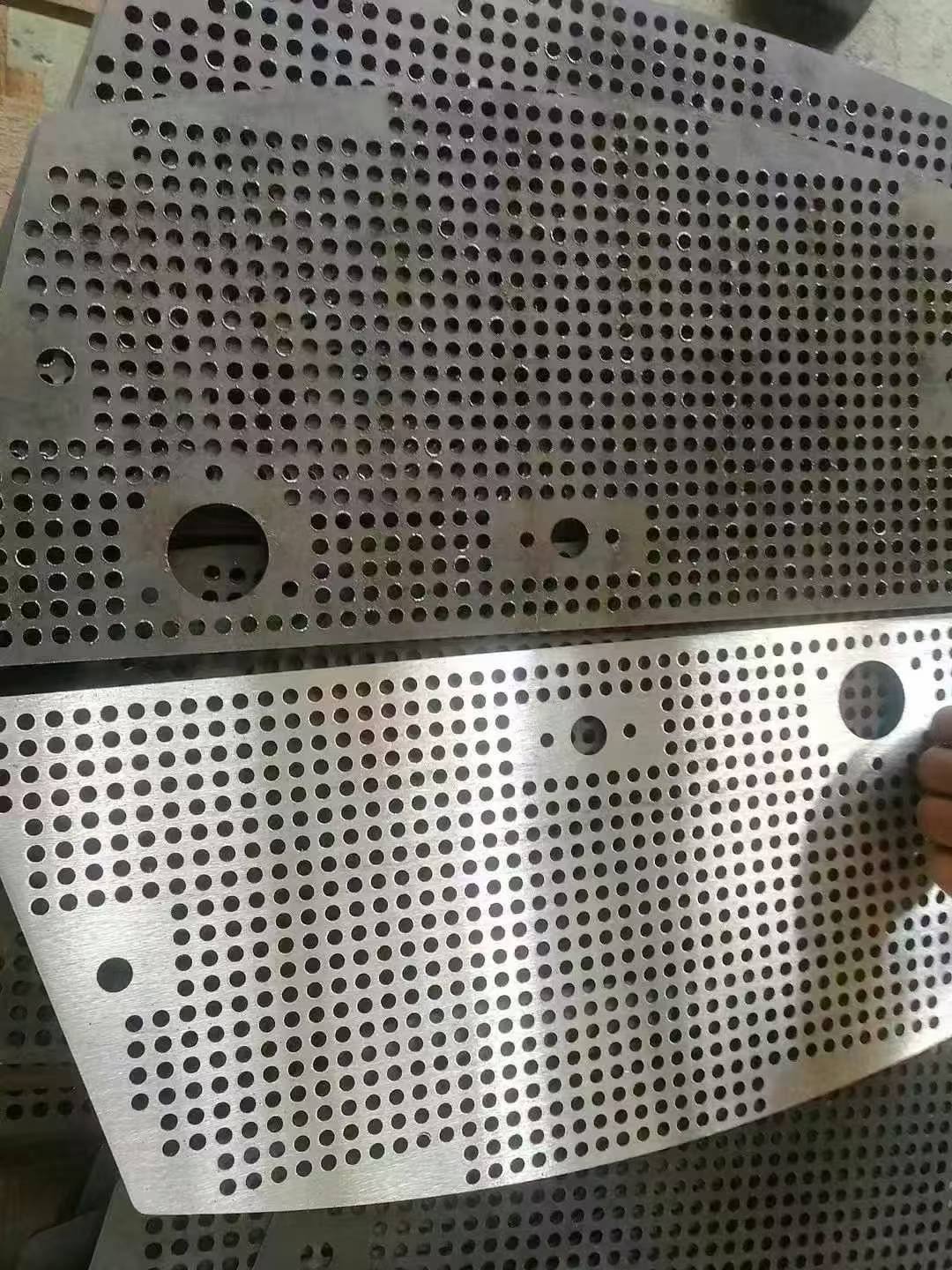 Laser-cut perforated carbon steel plate before and after deburring